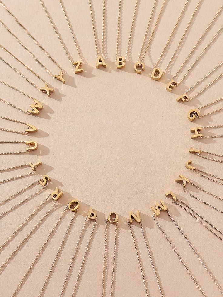 Gold Small letters Necklace